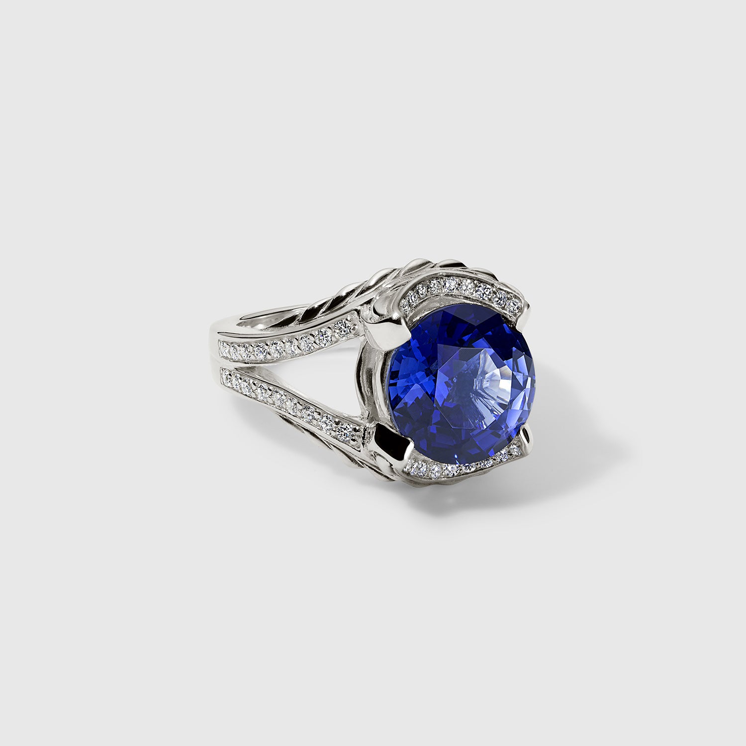 Daneila Léon silver Persian Shield leaf ring with lab-grown diamonds and 4.5 carat lab-grown blue sapphire
