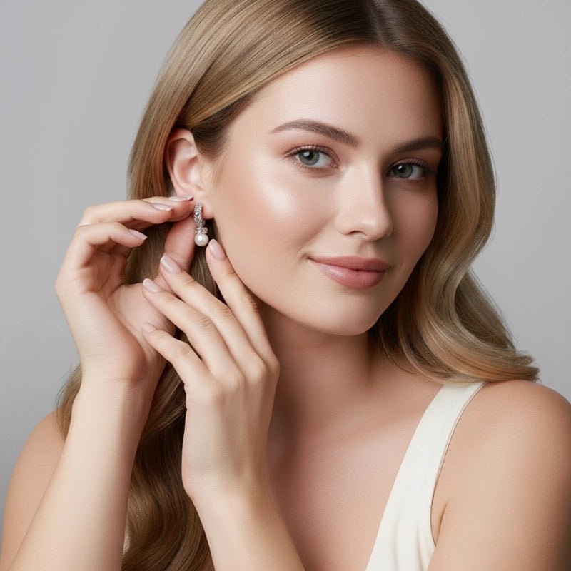 Daneila Léon silver Persian Shield leaf earrings with 8mm rounded freshwater pearls