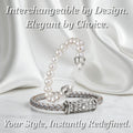 Interchangeable sterling silver bracelet with pearl strand and Persian Shield clasp, displayed on white satin fabric. Elegant design showcasing customizable jewelry style.