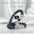 Blue Tiger Eye interchangeable bracelet with sculpted Persian Shield silver clasp and diamond accents, styled on white satin with tagline “Layer, Switch, and Define Your Style. Your Bracelet. Your Expression.”